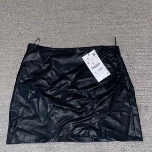 Brand new leather mini skirt